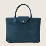 Front view of the Alessia Large Tote in bottle green suede with the flap closed