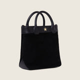Kelly Medium Shopper in black suede with gold star detail, three-quarter view