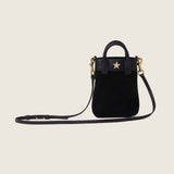 Lola Mini Shopper in black suede with its shoulder strap attached, front view