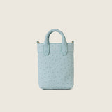 Front view of the Lola Mini Shopper in light blue ostrich