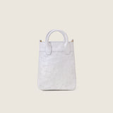 Back view of the Lola Mini Shopper in white ostrich