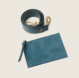 Removable bottle green suede cross-body pouch from the Lucille Mini Tote, shown with its strap