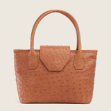 Front view of the Lucille Mini Tote in tan ostrich with the flap closed