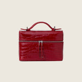 Front view of the Mia Vanity Bag in cherry red alligator