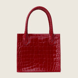 Back view of the Molly Mini Book Tote in cherry red alligator