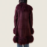 Back view of the Alexa burgundy shearling and Tibetan lamb coat