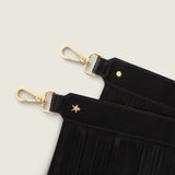 Close-up of the Fringe Shoulder Strap in black nappa leather with gold clasps and star detail
