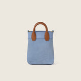Back view of the Lola Mini Shopper in blue suede