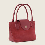 Lucille Mini Tote in begonia suede with gold star detail, three-quarter view