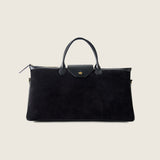 Front view of the Maverick Weekender in black suede with gold star detail