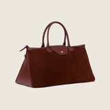 Maverick Weekender in cognac suede, three-quarter view