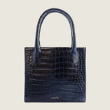 Front view of the Molly Mini Book Tote in navy alligator