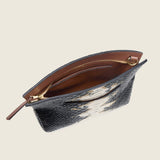 Taylor Mini Clutch in black and camel python-embossed leather unzipped to show the brown interior lining