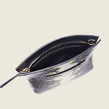 Taylor Mini Clutch in black and lime python-embossed leather unzipped to show the dark interior lining